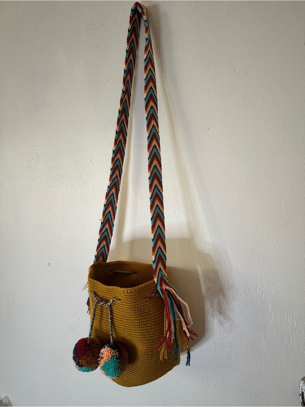 Small Wayuu Tribe Handcrafted Mustard Bucket Bag with Chevron Multicolor Strap